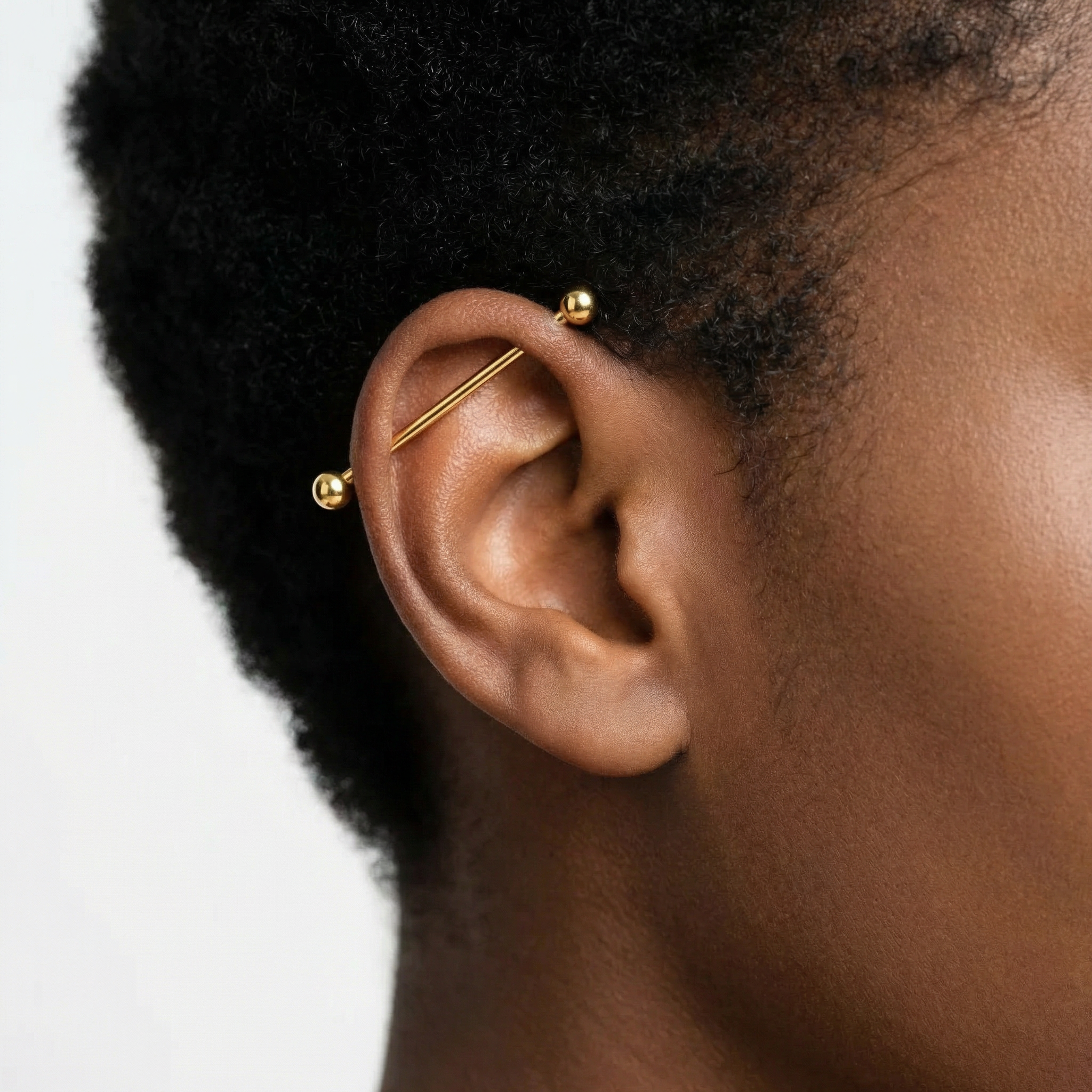 Piercing Barre Droite & Bille Titane Gold