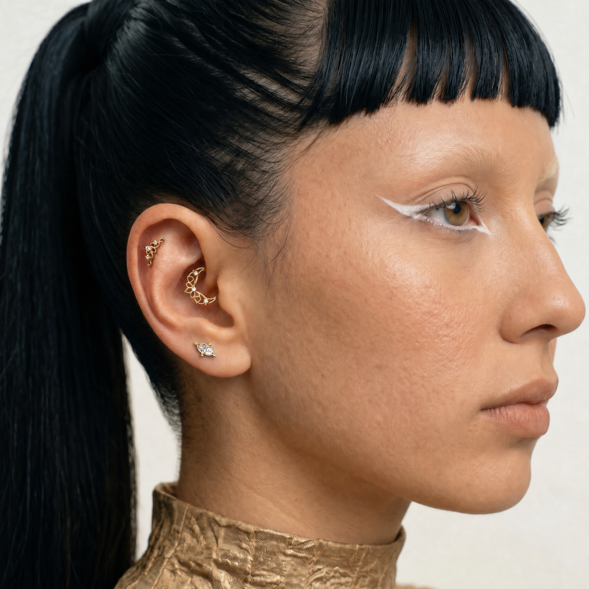 Compo piercing oriental titane gold – Halo