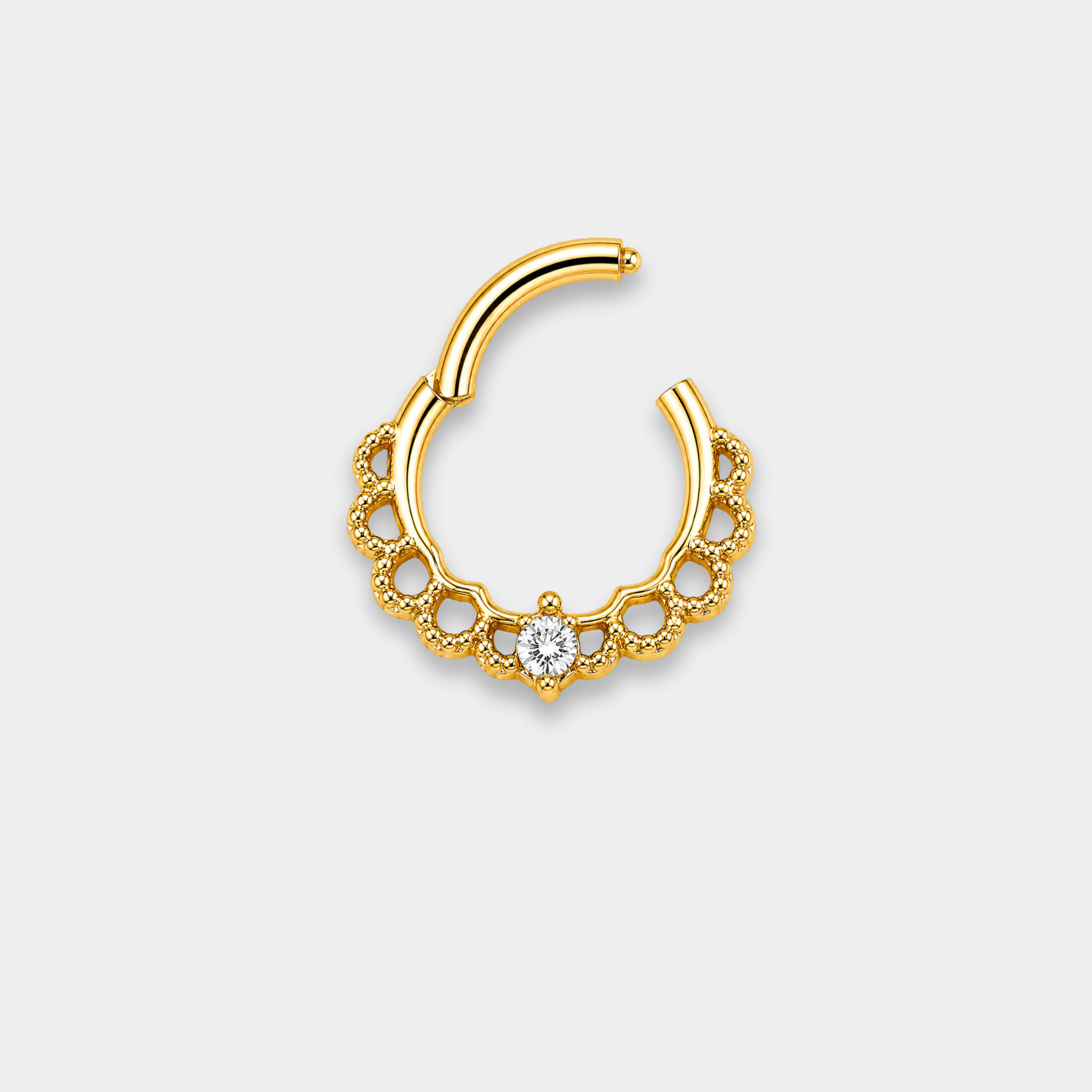 Anneau piercing Aurea ouvert en titane gold avec détails perlés ajourés et zircon central serti