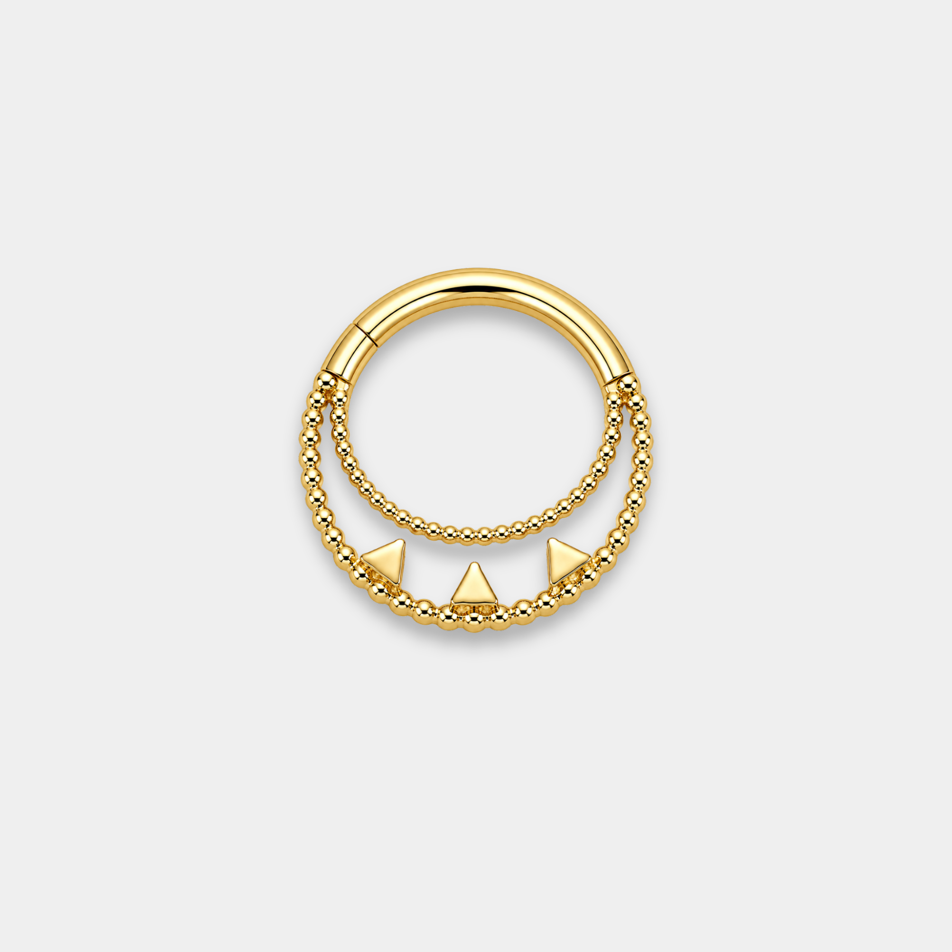 Anneau piercing Elio en titane gold vu de dos avec double rangée perlée et trois zircons sertis