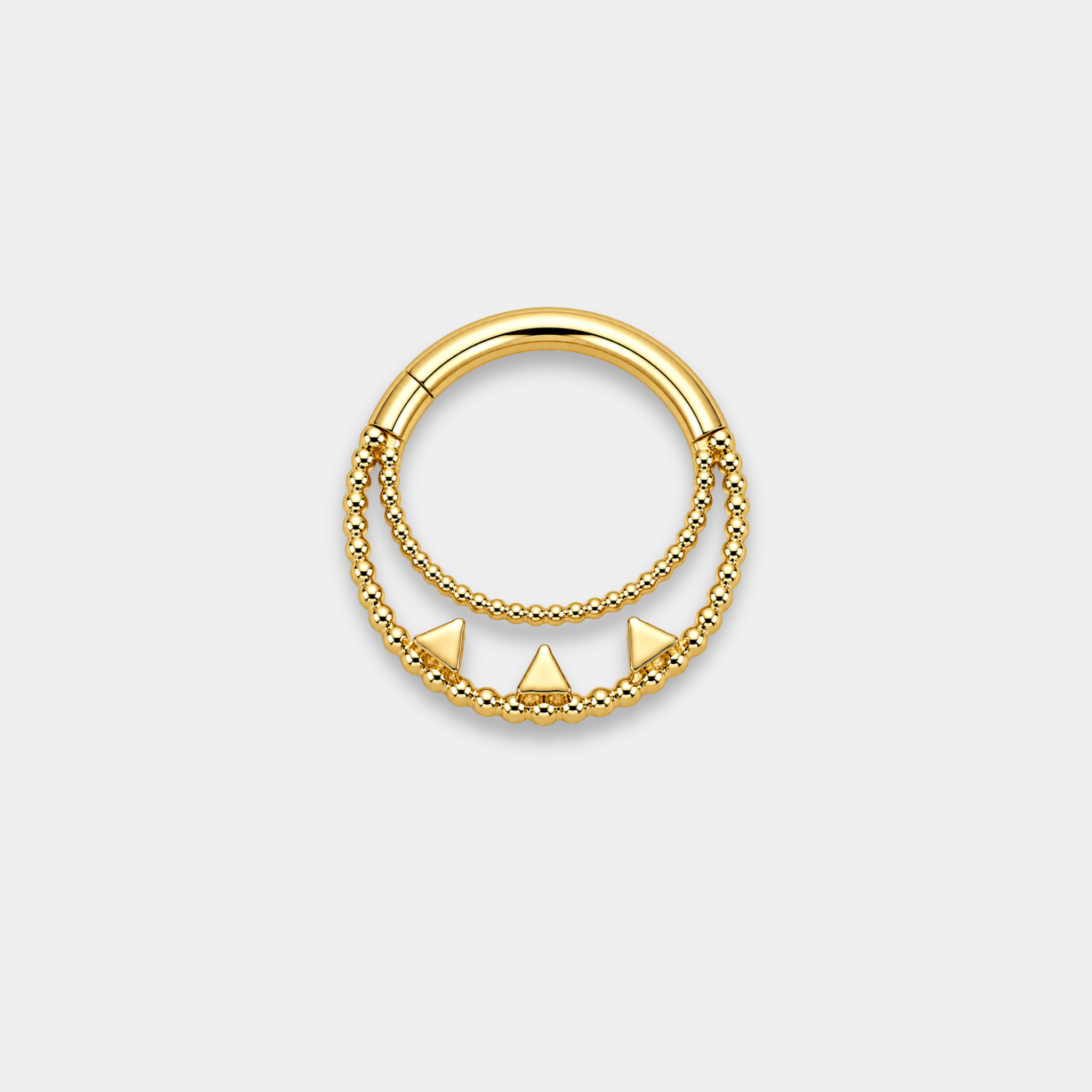Anneau piercing Elio en titane gold vu de dos avec double rangée perlée et trois zircons sertis
