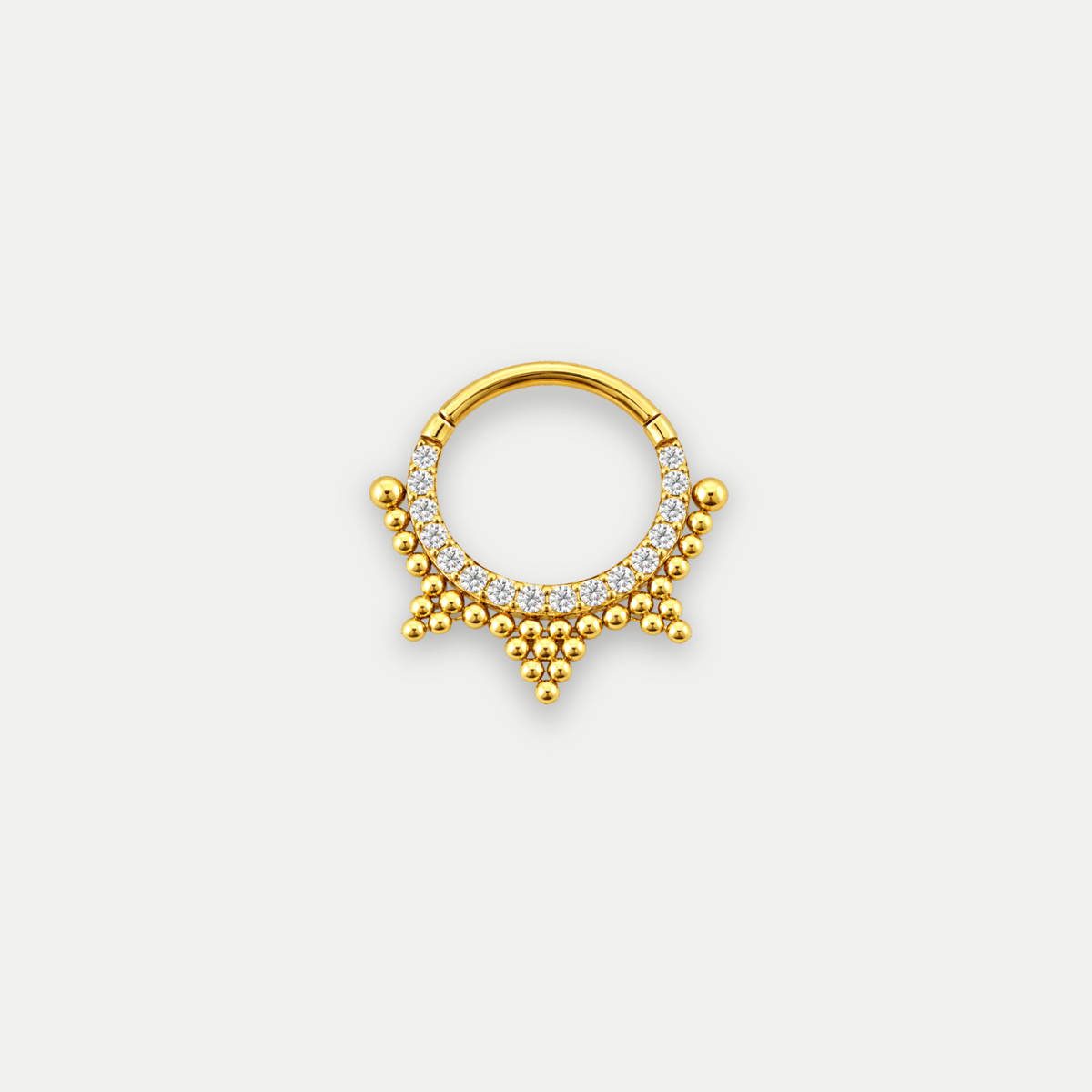 Anneau piercing Lina en titane gold avec zircon, vu de face
