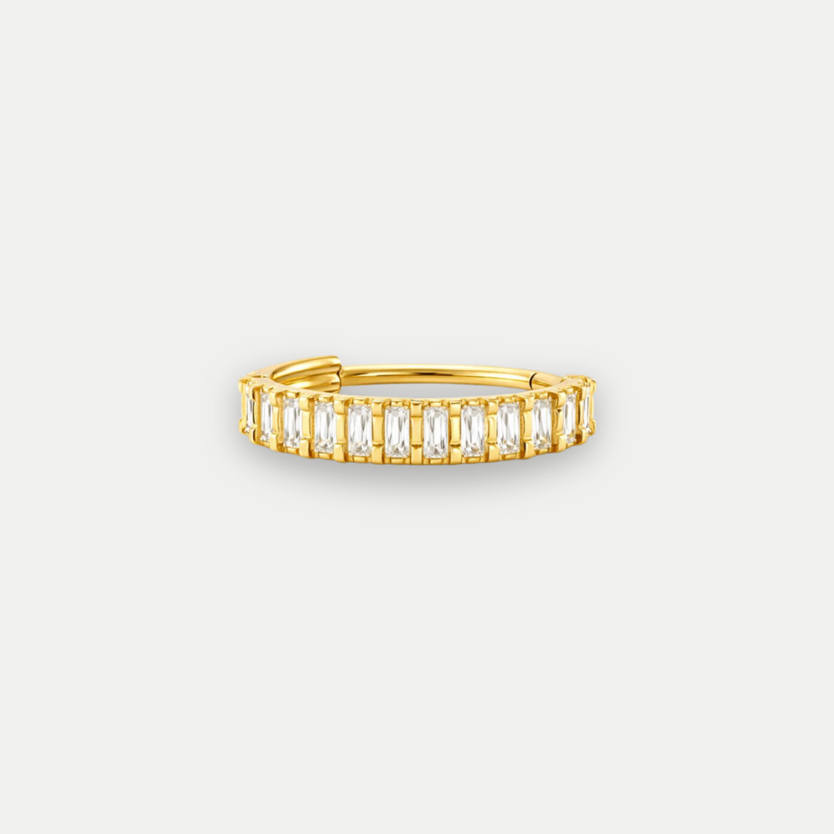 Anneau piercing Lirai en titane gold avec zircon, vu de face