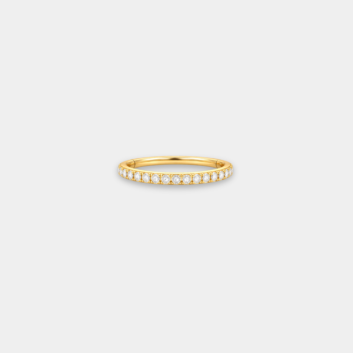 Anneau piercing Luan en titane gold avec zircon, vu de côté