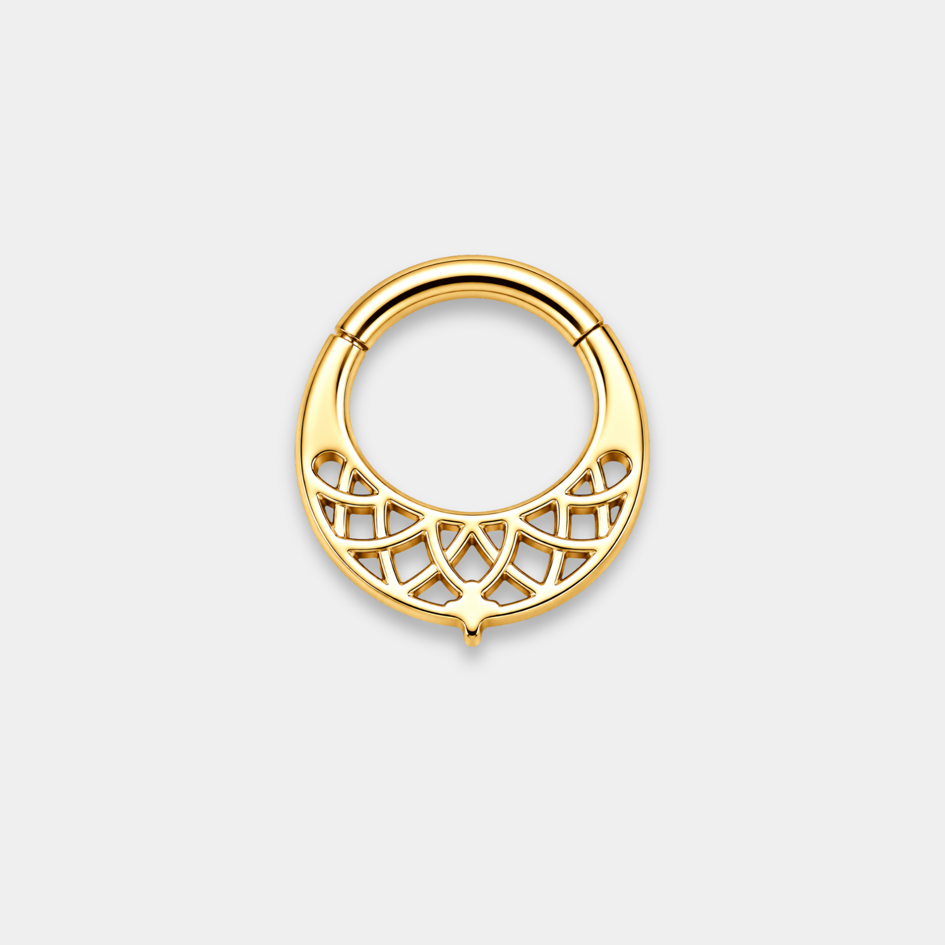 Anneau piercing Lumis en titane gold vu de dos avec motifs géométriques ajourés et trois zircons sertis
