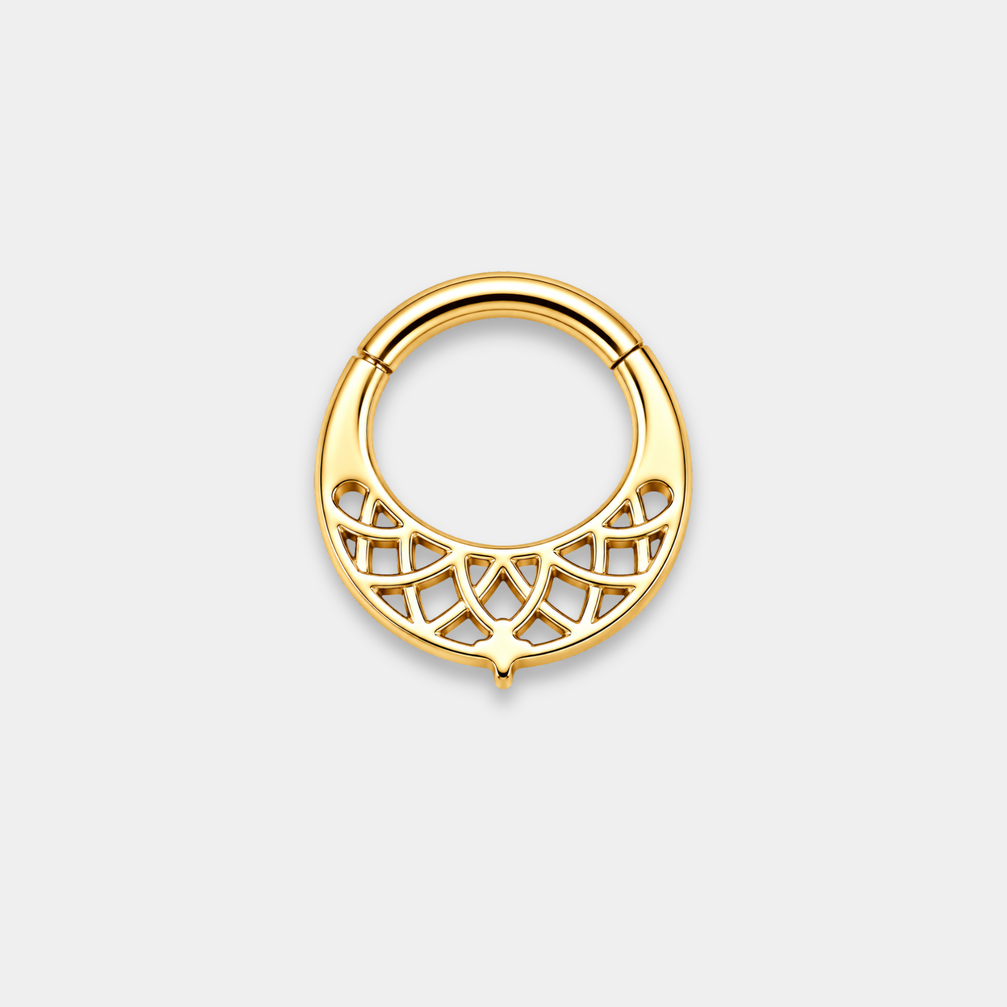 Anneau piercing Lumis en titane gold vu de dos avec motifs géométriques ajourés et trois zircons sertis
