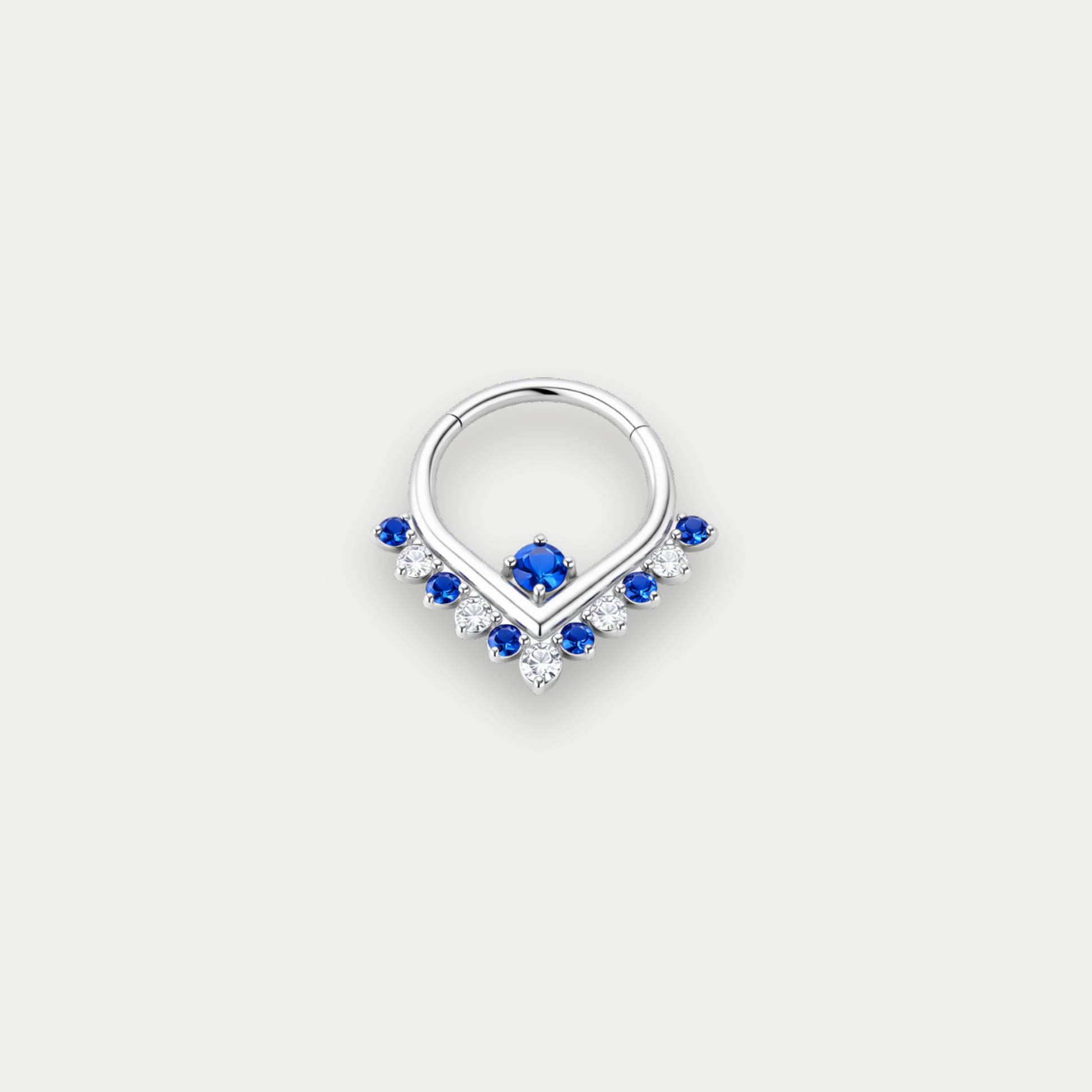 Anneau piercing Mena en titane ASTM F136 avec zircons bleus et blancs motif V