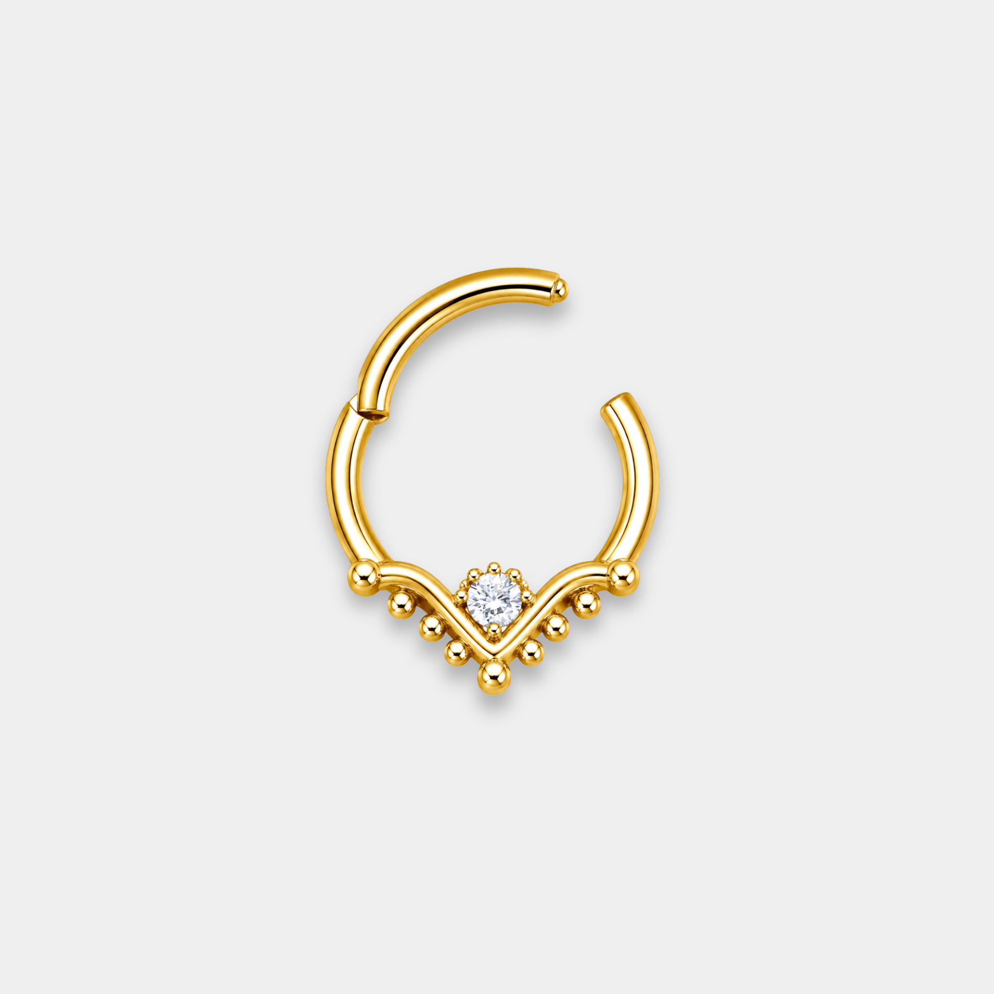 Anneau piercing Raya ouvert en titane gold avec zircon central serti et détails perlés en forme de V