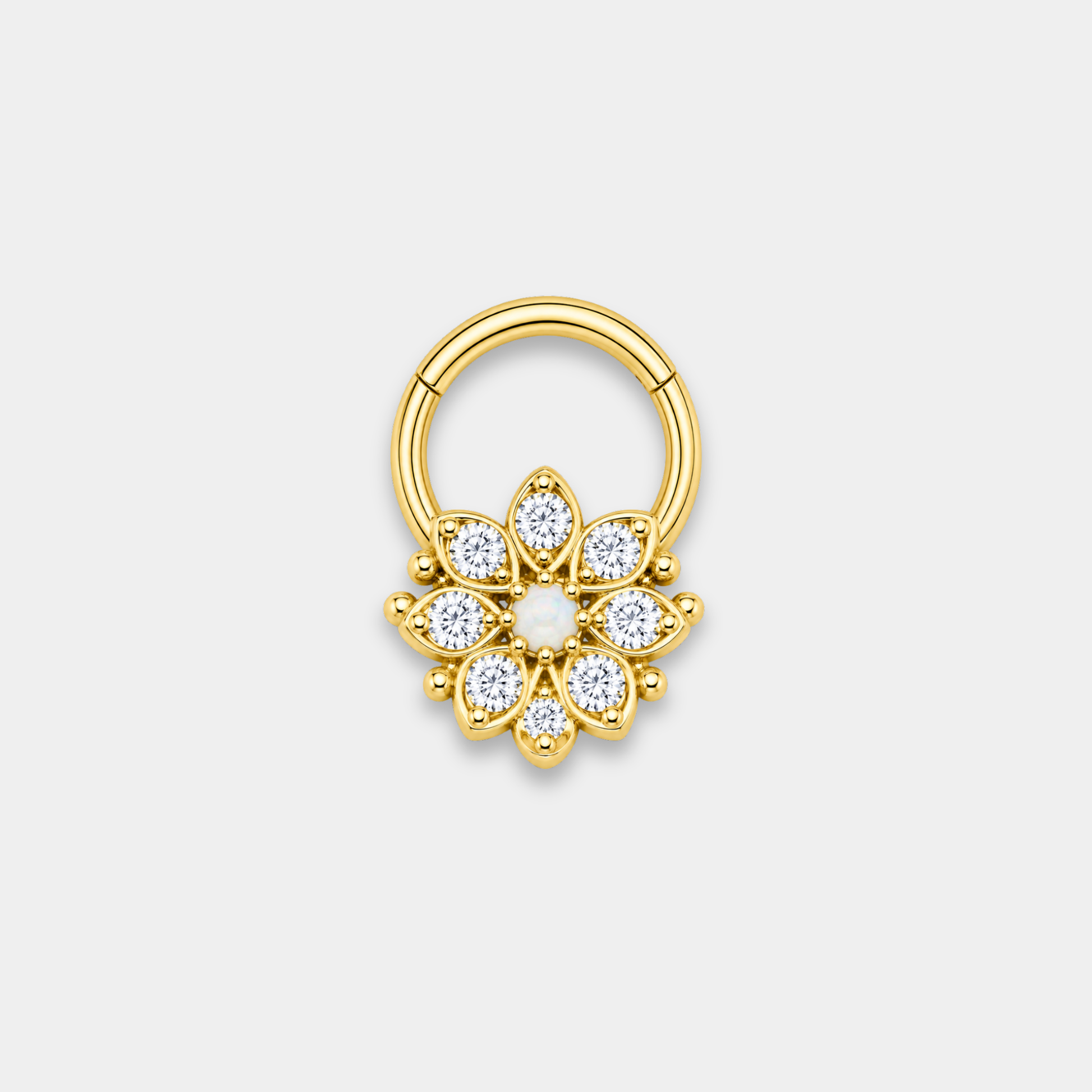Anneau piercing Solenor en titane gold avec zircons sertis et opale blanche en motif floral de face