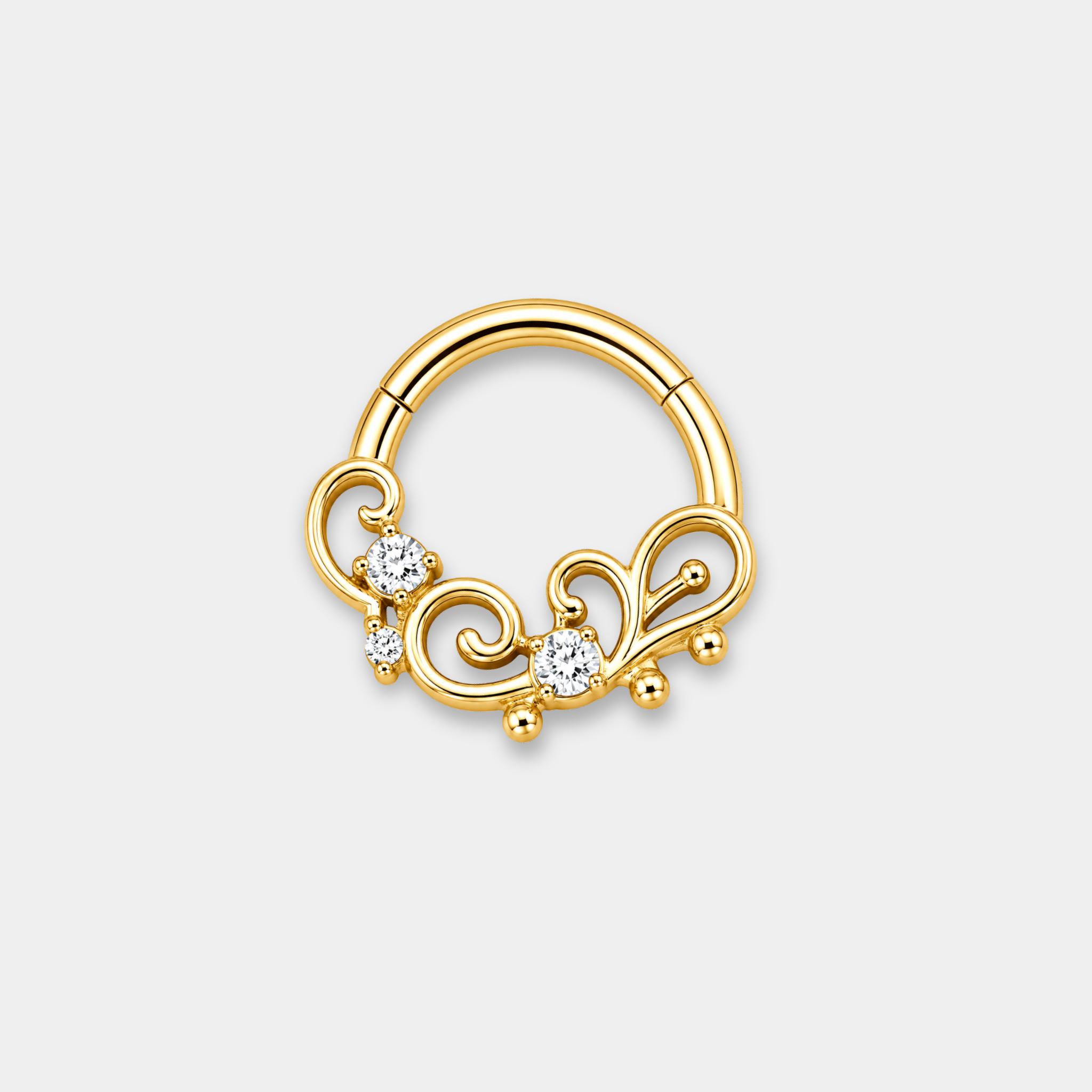 Anneau piercing Solis en titane gold avec courbes élégantes et zircons sertis de face