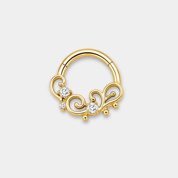 Anneau piercing Solis en titane gold avec courbes élégantes et zircons sertis de face