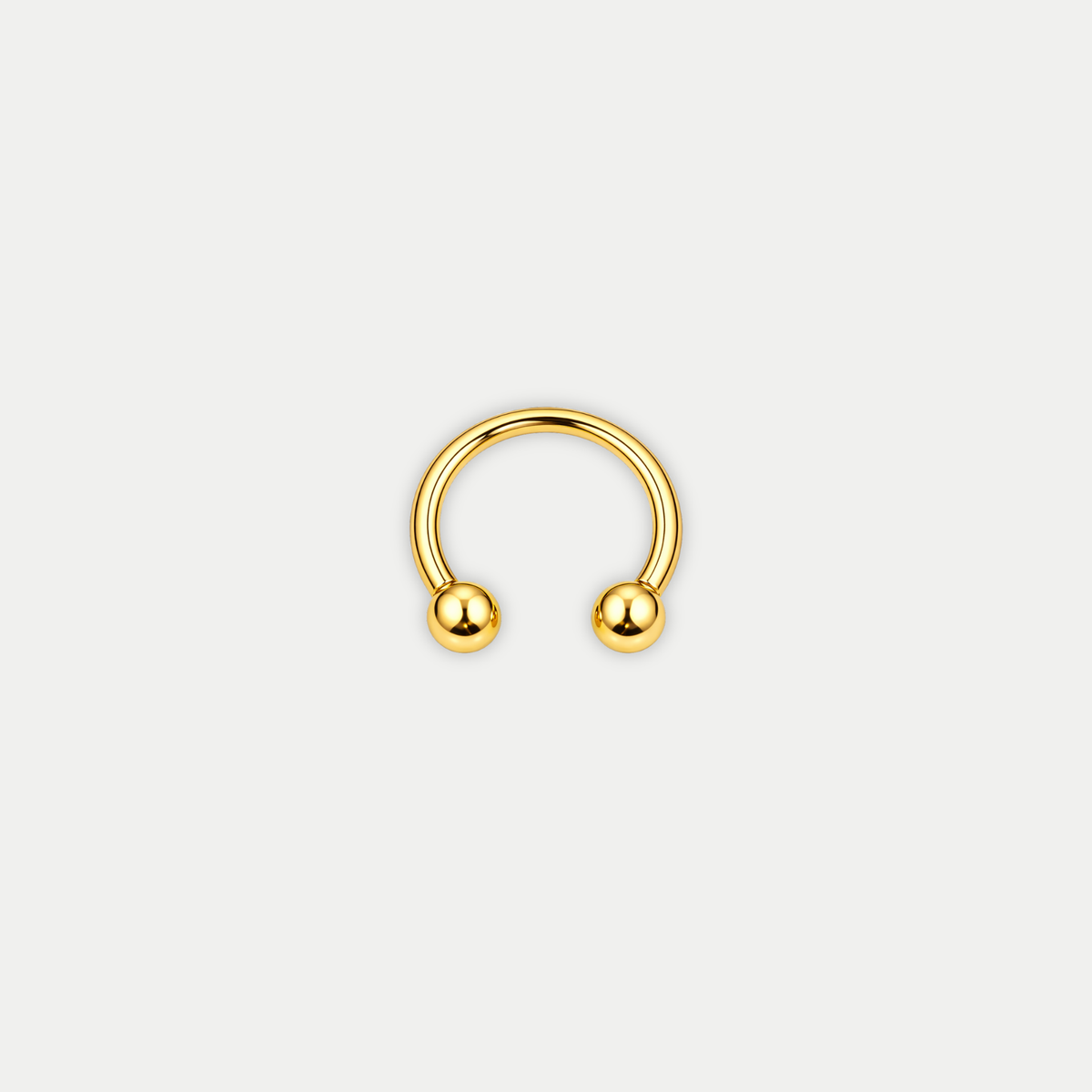 Barre fer à cheval piercing en titane gold avec billes, vu de face