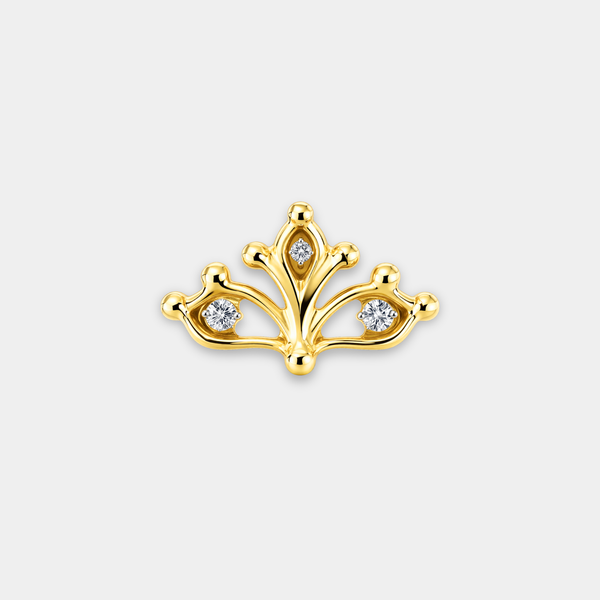 Embout piercing Helia en titane gold avec trois zircons sertis et motif ajouré de face