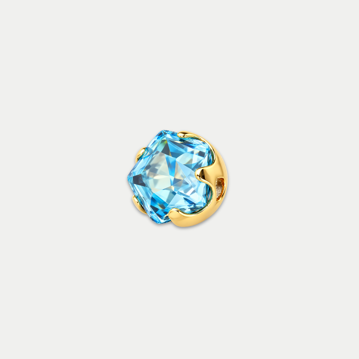 Embout piercing Iriséa en titane gold avec zircon bleu turquoise, vu de face