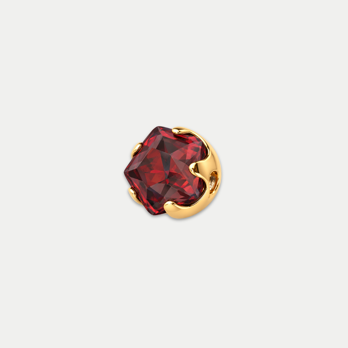 Embout piercing Iriséa en titane gold avec zircon rouge, vu de face