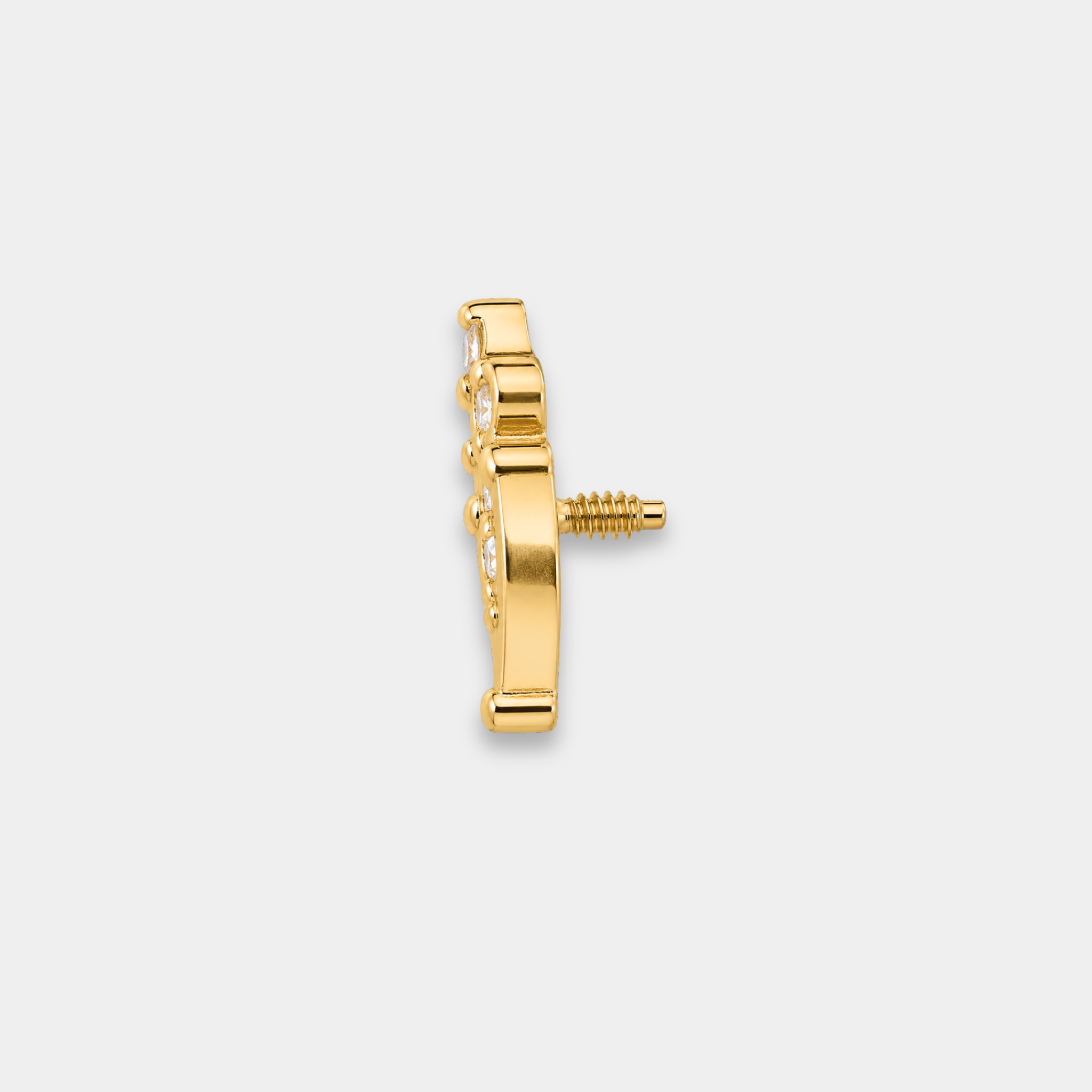 Embout piercing Liora en titane gold avec zircons sertis et détail central ajouré de cote