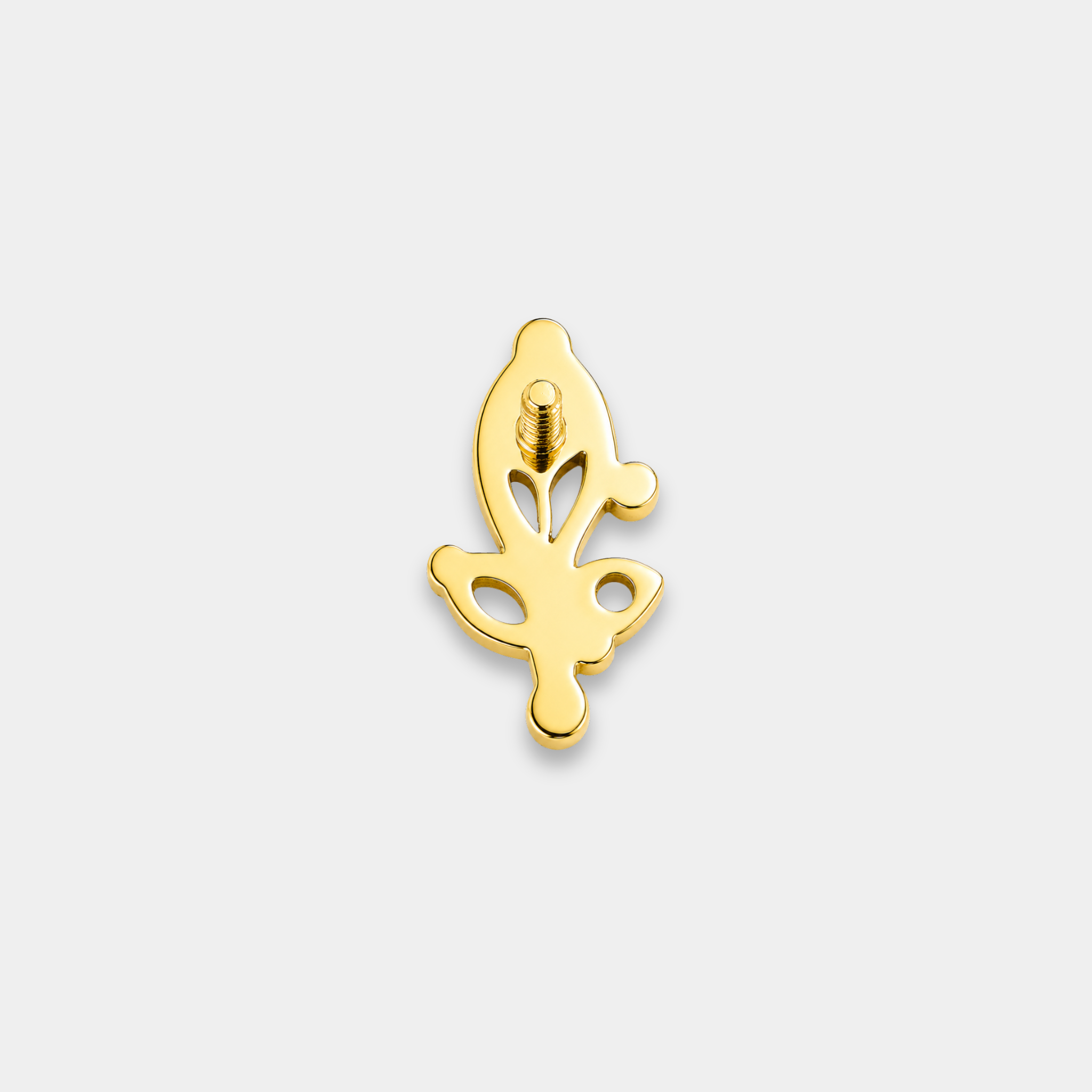 Embout piercing Luma en titane gold vu de dos avec deux zircons ronds sertis, une pierre marquise brillante et courbes délicates ajourées