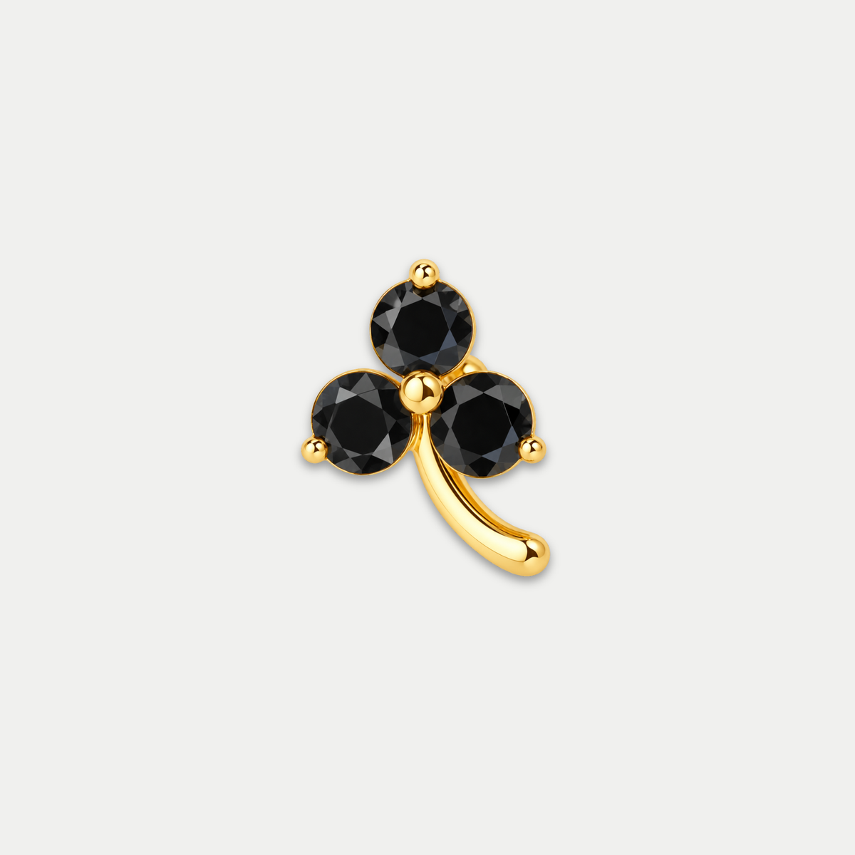 Embout piercing Nika en titane gold avec zircon noir, vu de face