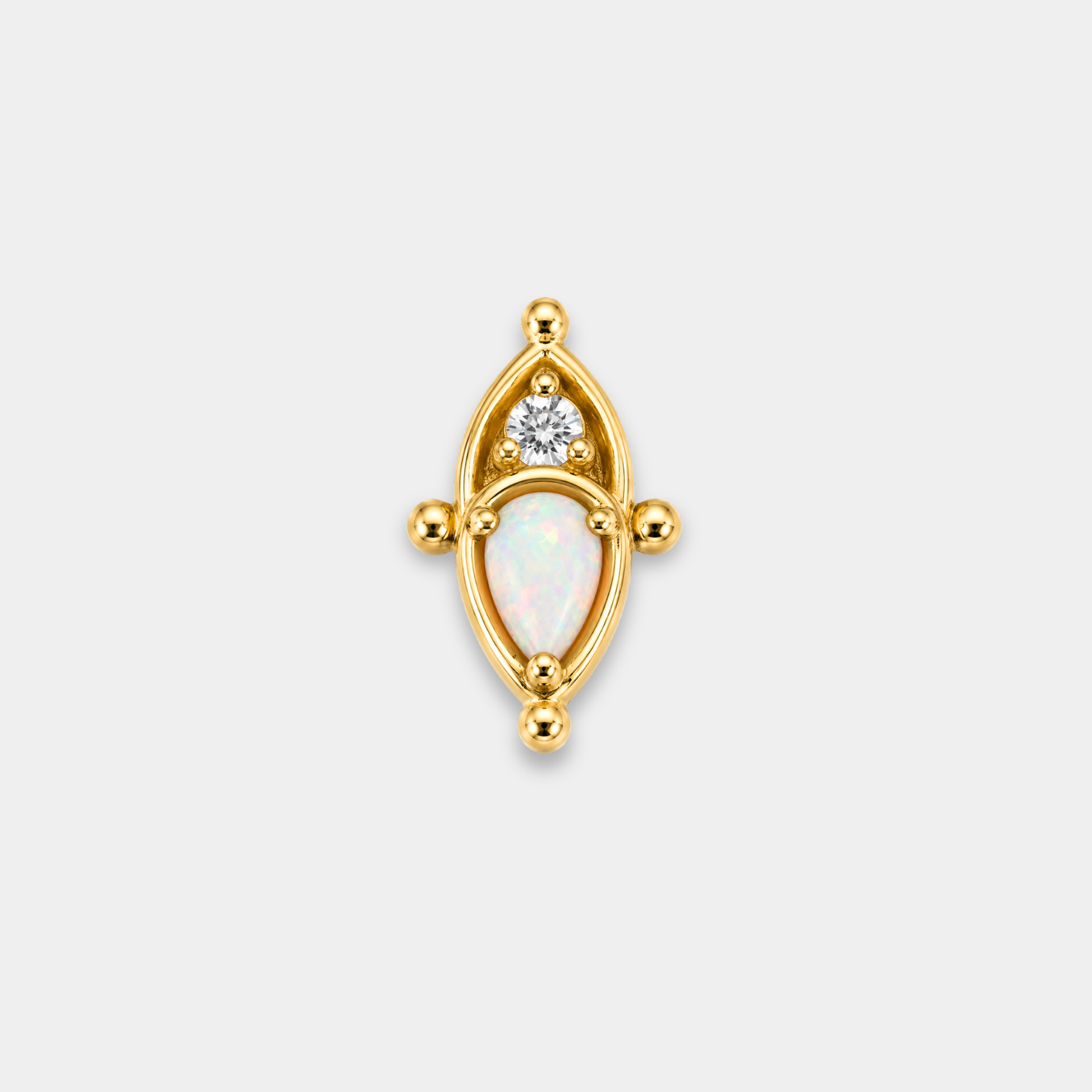 Embout piercing Nova en titane gold avec zircon rond blanc serti, opale blanche en forme de goutte et contours délicatement ajourés de face