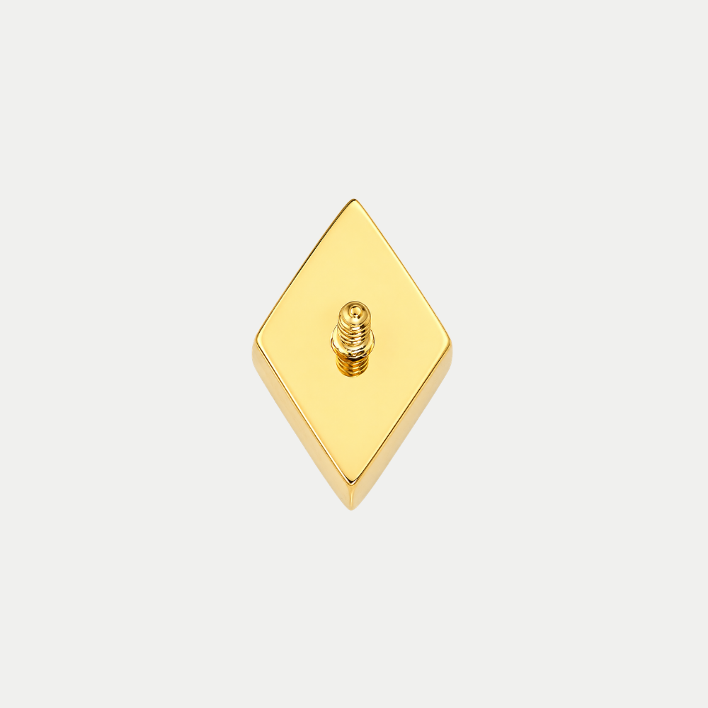 Embout piercing Prism en titane gold, motif losange aux lignes concentriques, vu de dos