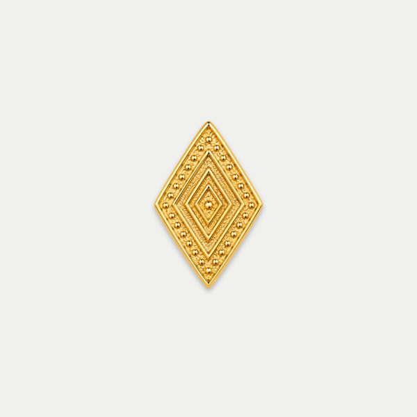Embout piercing Prism en titane gold, motif losange aux lignes concentriques, vu de face