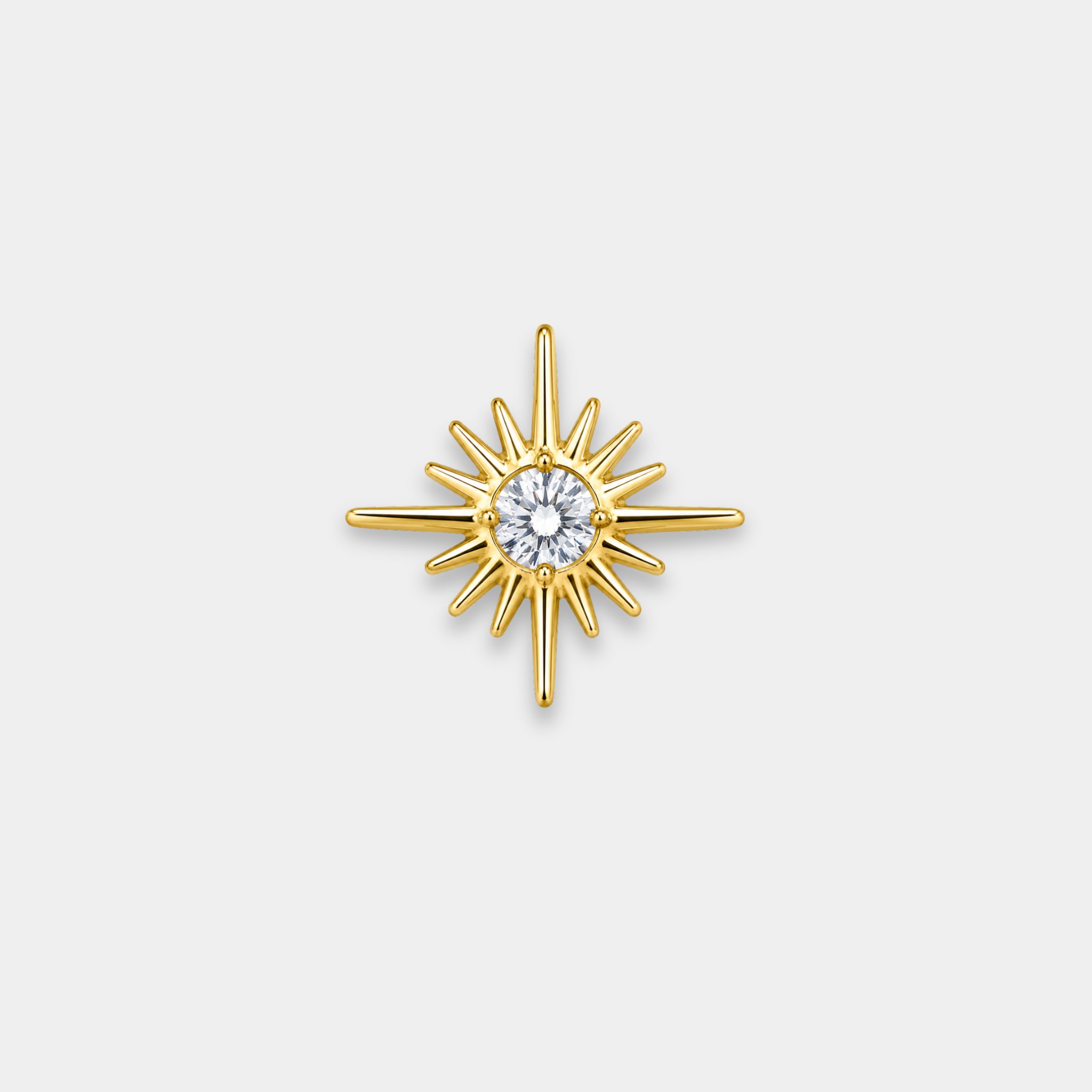 Embout piercing Solaris en titane gold avec zircon blanc central et motif étoile soleil de face