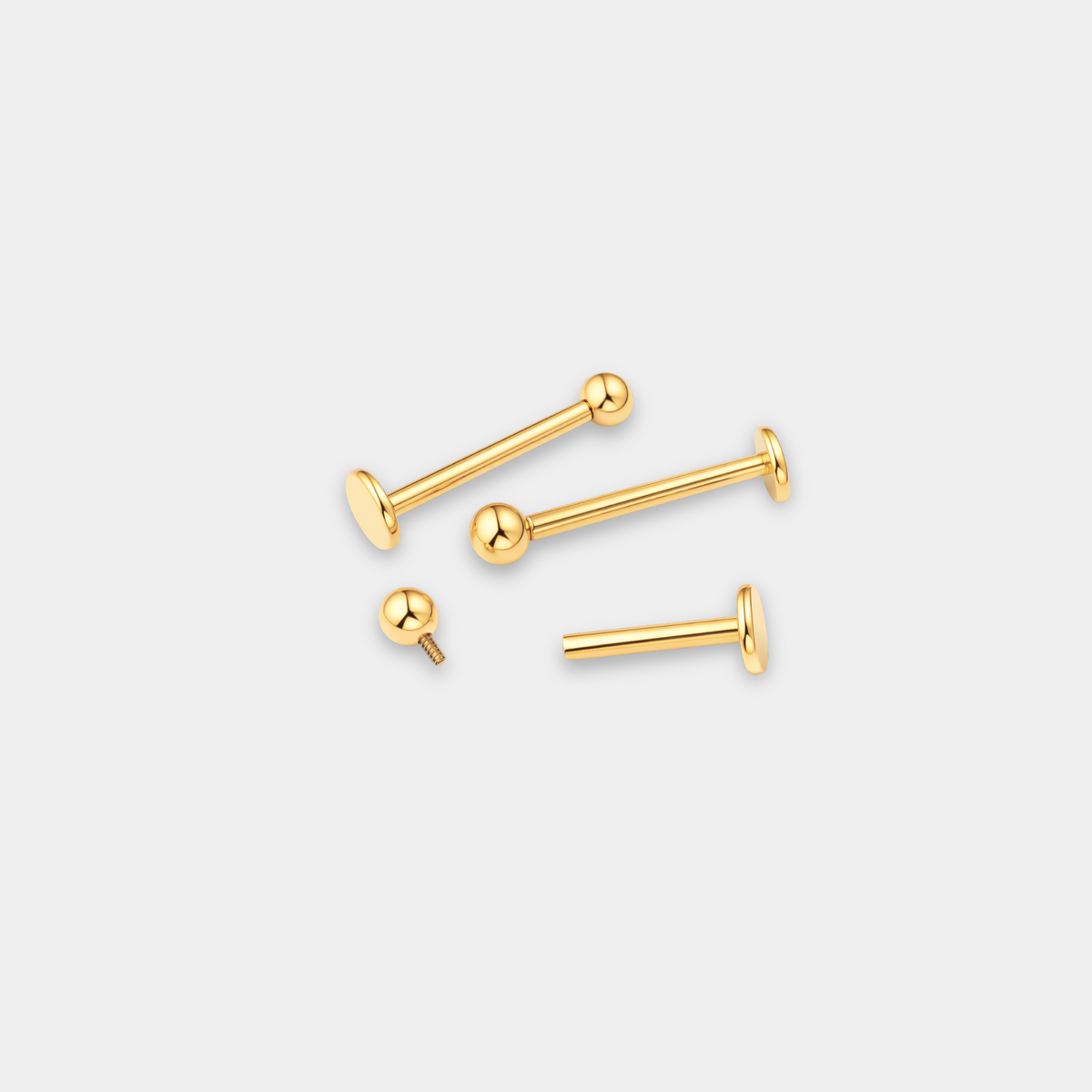 Labret piercing en titane gold avec bille, en plusieurs longueurs