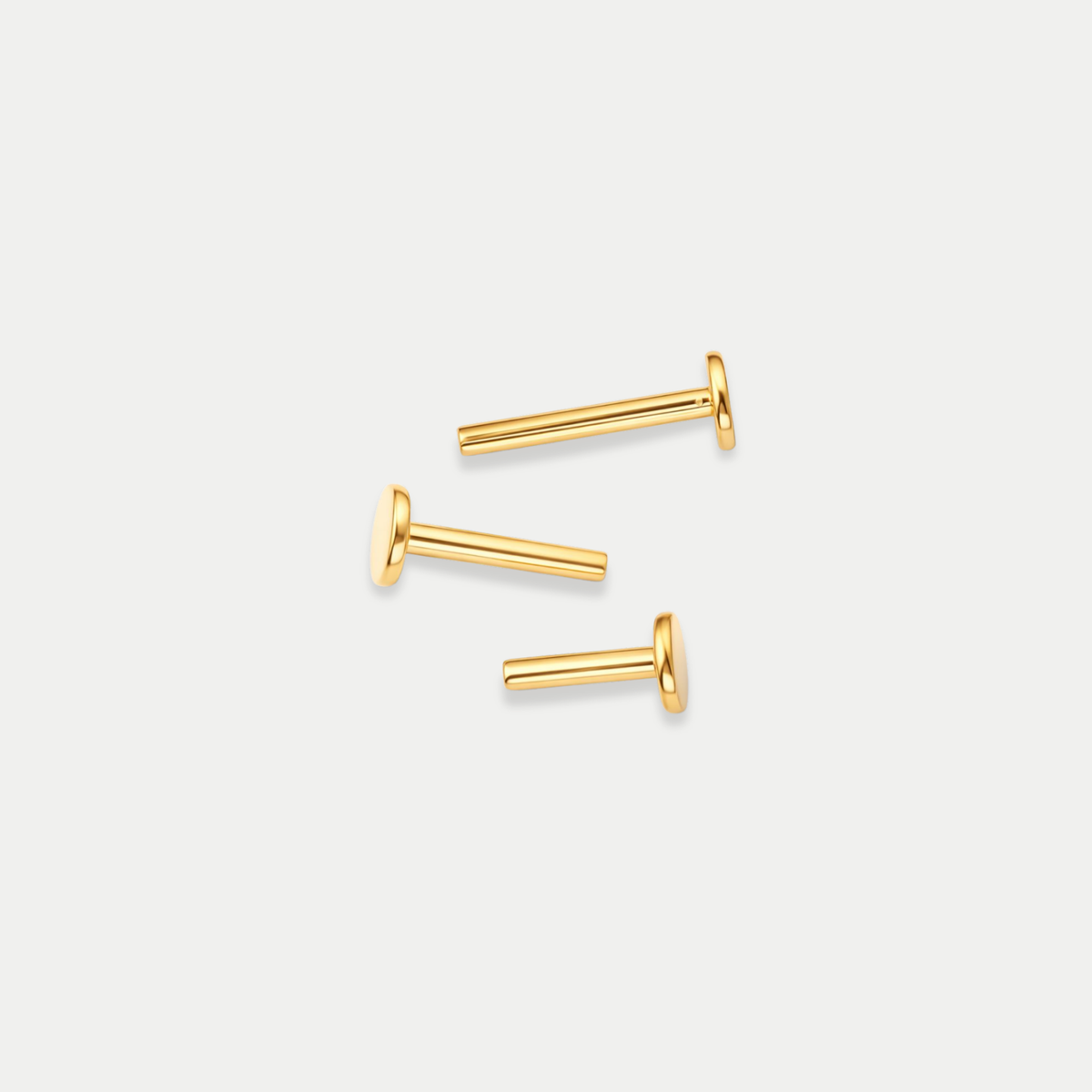 Labret piercing en titane gold, en plusieurs longueurs